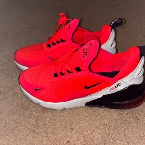 Nike Red and Black Sneakers with Breathable Mesh Upper